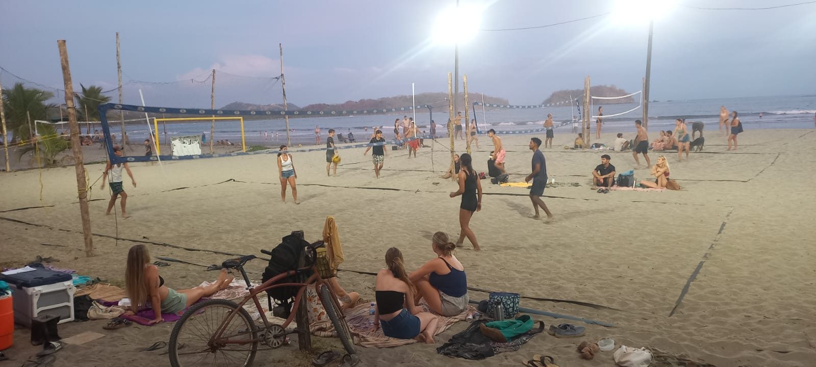 Evening beach volleyball under the lights in Sámara